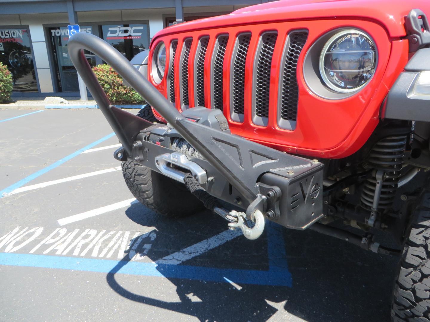 2019 Red /Black Jeep Wrangler Unlimited Rubicon (1C4HJXFN7KW) with an 2.0L L4 DOHC 16V TURBO engine, automatic transmission, located at 2630 Grass Valley Highway, Auburn, CA, 95603, (530) 508-5100, 38.937893, -121.095482 - Rubicon JL ready for all of your offroad adventures. This Jeep is sitting on a Rubicon Express lift kit, RE 2.5 Extreme series shocks, 17" Method bead grip wheels, 37" BFG KO2 tires, EVO front bumper, Warn winch, Road Armor rock slliders, and a HD Jeep spare tire carrier. - Photo#10